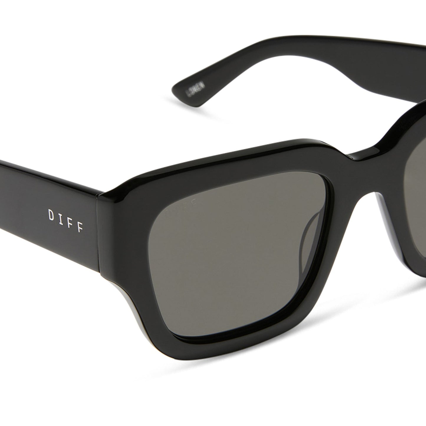 jessie james decker x diff eyewear featuring the loren square sunglasses with a black frame and grey lenses detailed view