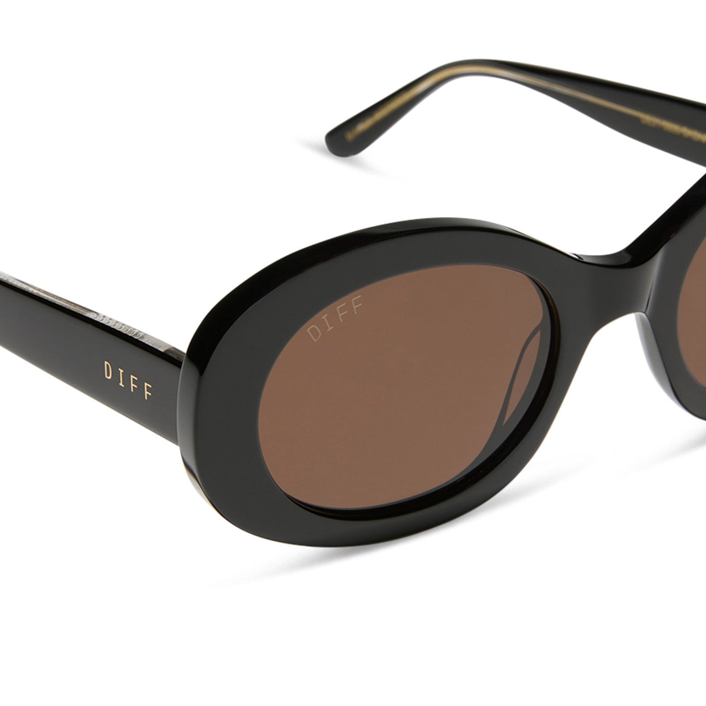 diff eyewear featuring the lainey oval sunglasses with a black frame and brown polarized lenses detailed view