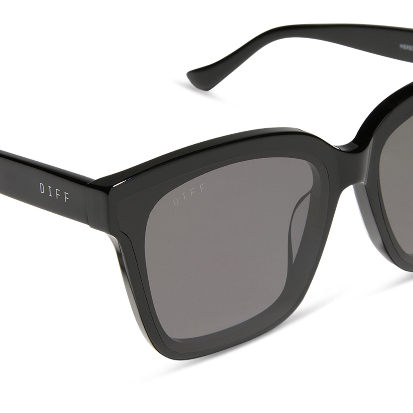 diff eyewear featuring the meredith ii square sunglasses with a black frame and grey lenses detailed view