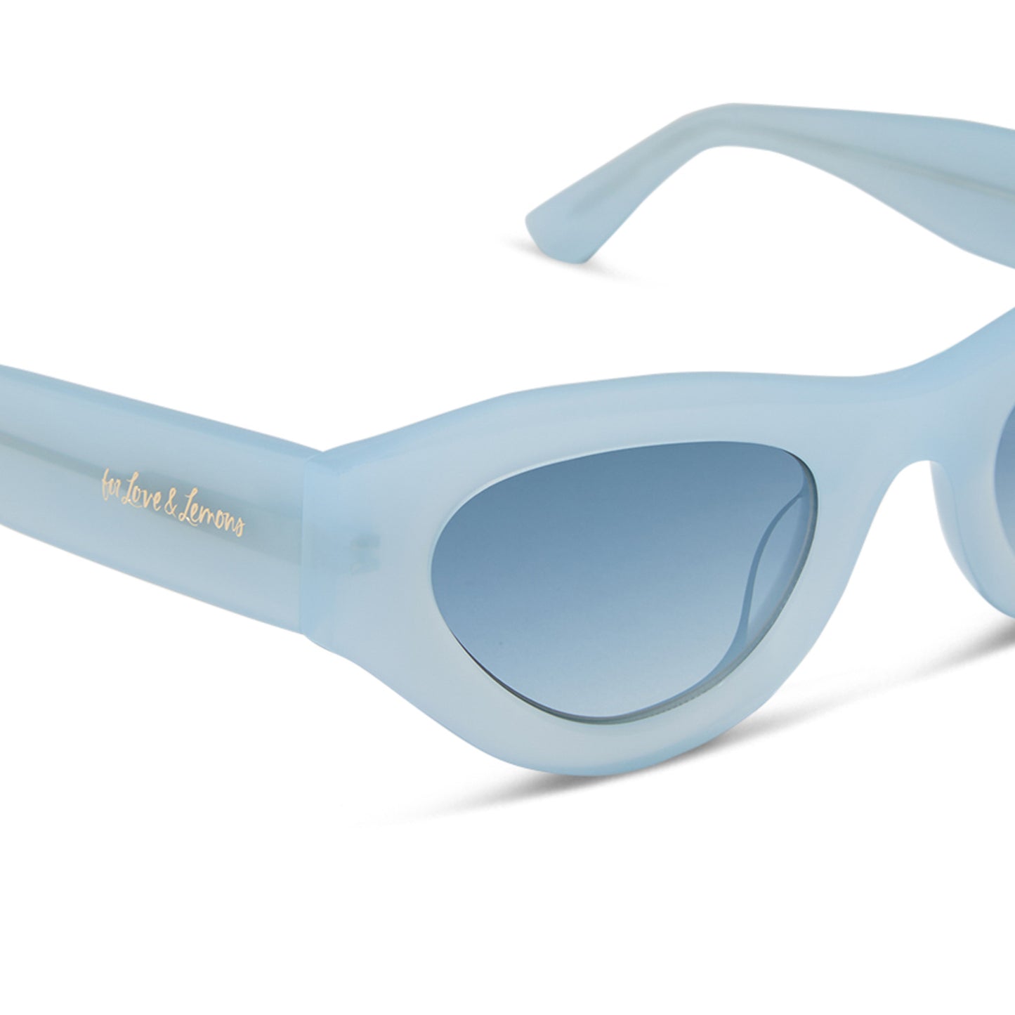 for love and lemons x diff eyewear featuring the lucy cat eye sunglasses with a pastel blue frame and blue gradient polarized lenses detailed view