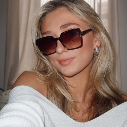 customer content - blonde female wearing esme espresso tortoise with brown gradient lenses