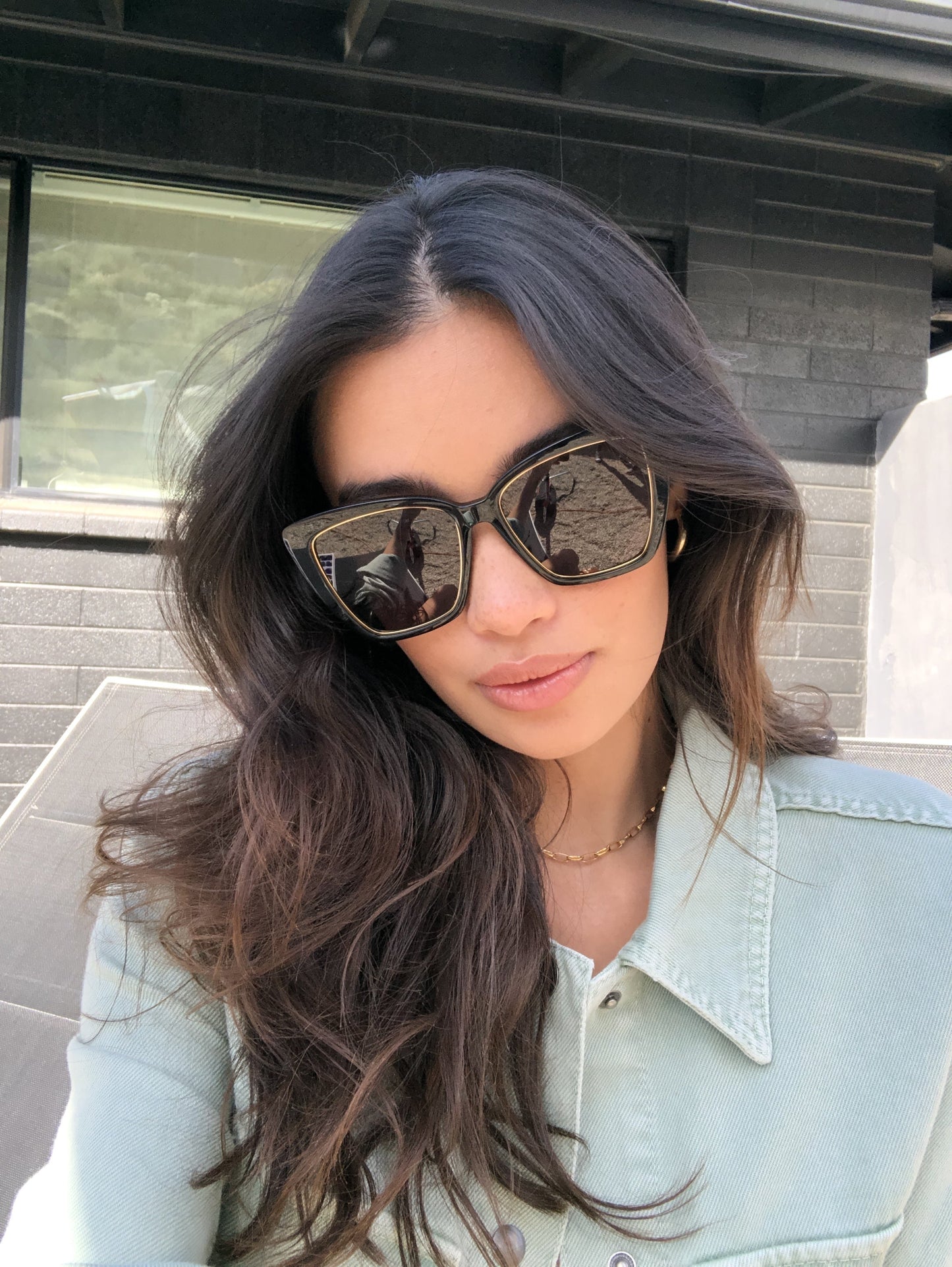 Customer Content - brunette wearing the becky iv black and grey polarized glasses