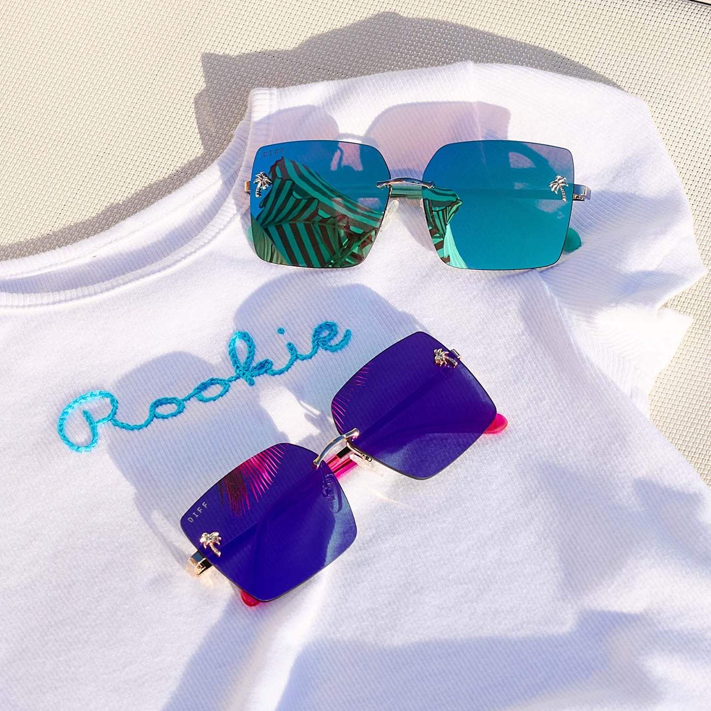 still life - group shot of jena sims x diff eyewear rookie mirrored sunglasses