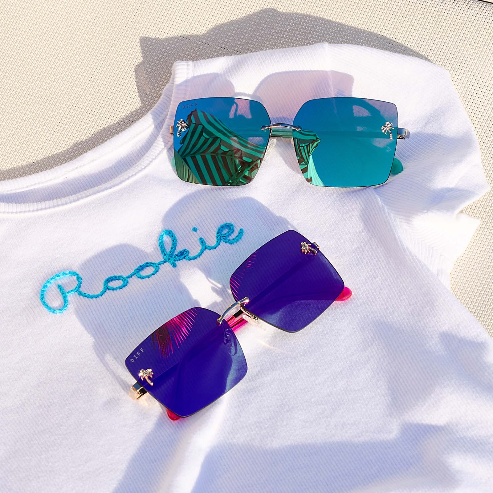 still life - group shot of jena sims x diff eyewear rookie mirrored sunglasses