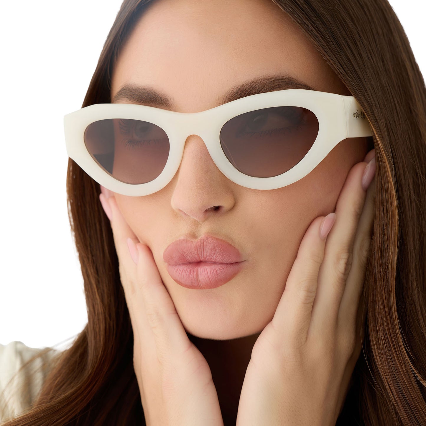 on model - female wearing for love and lemons x diff eyewear featuring the lucy cat eye sunglasses with a meringue cream frame and brown gradient lenses close up view