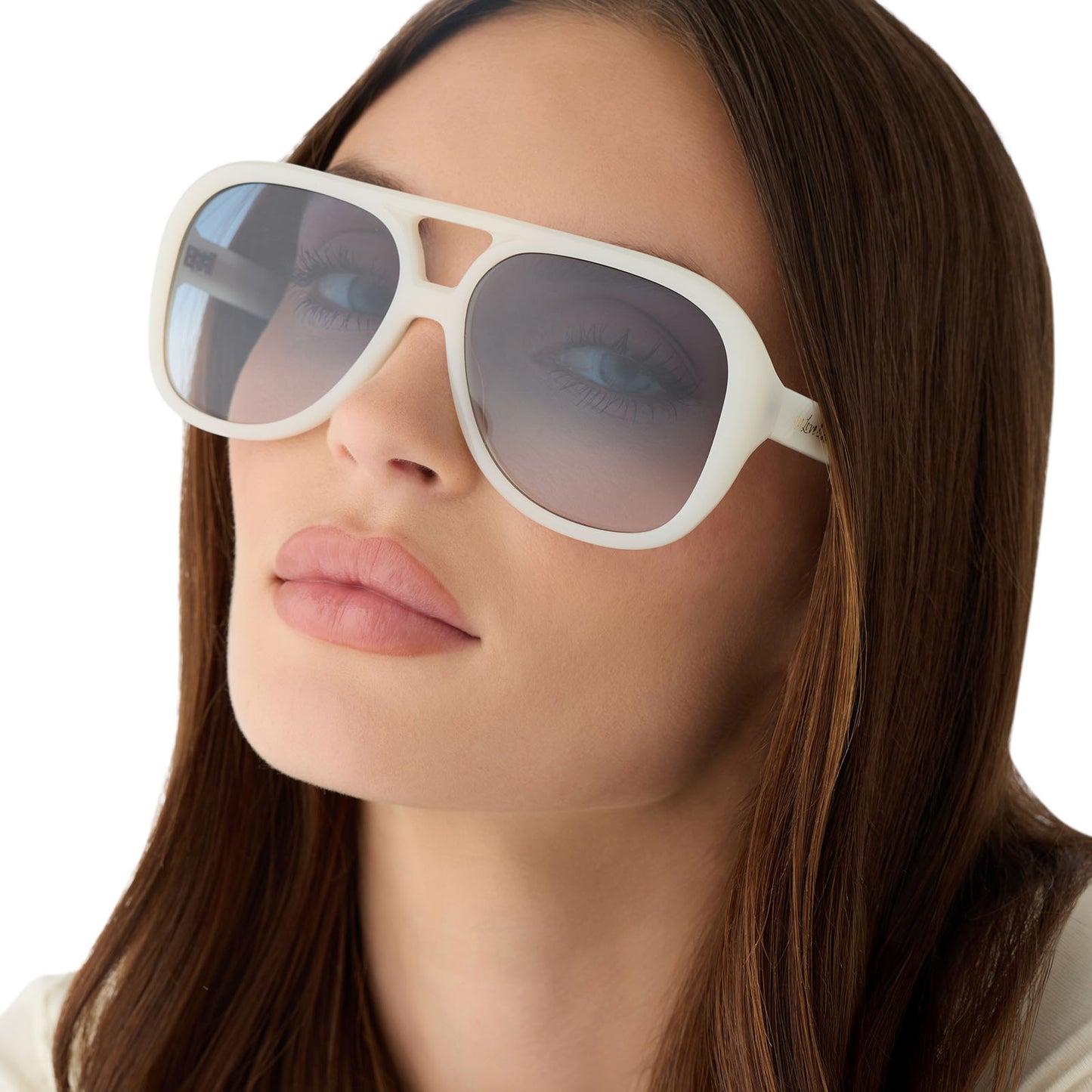 on model - female wearing for love and lemons x diff eyewear featuring the pauline aviator sunglasses with a meringue cream frame and blue gradient lenses front view