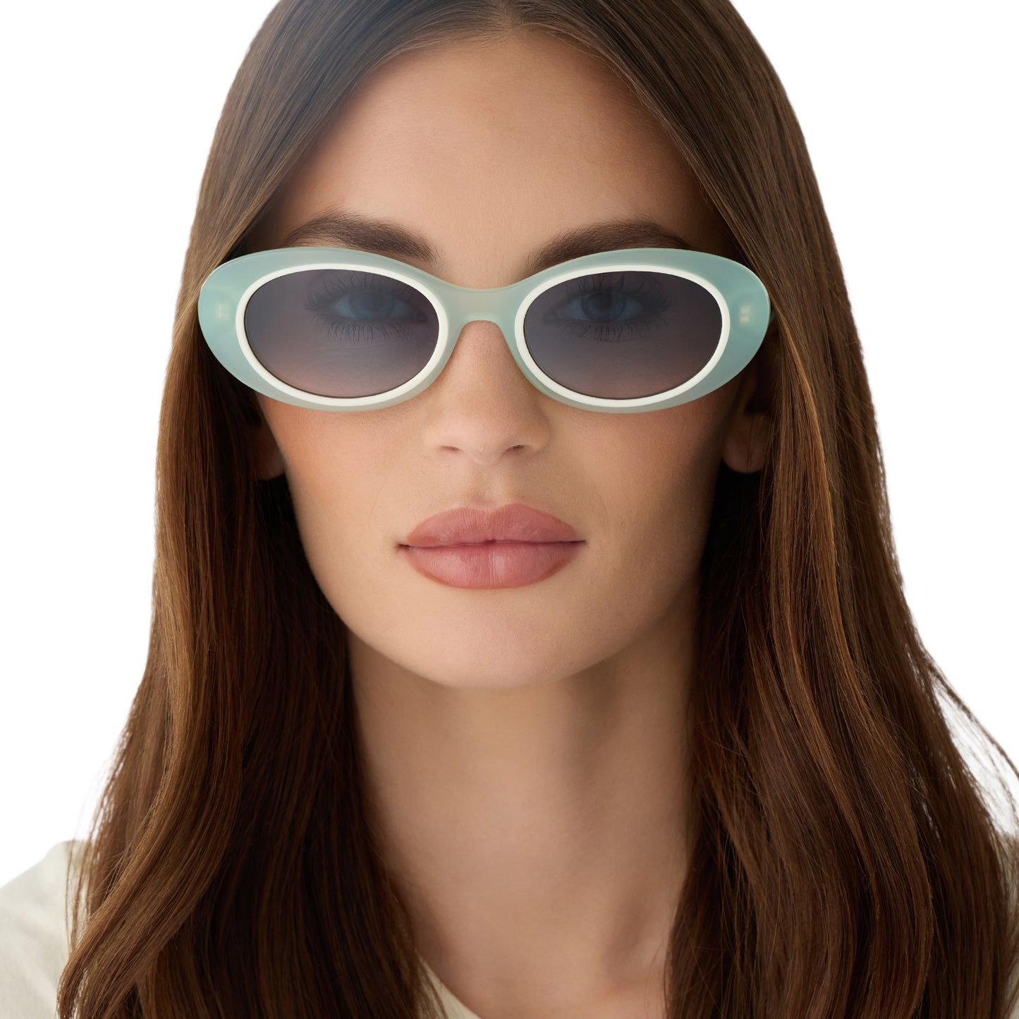 on model - female wearing for love and lemons x diff eyewear featuring the sabrina oval sunglasses with a pastel sage frame and blue gradient lenses front view