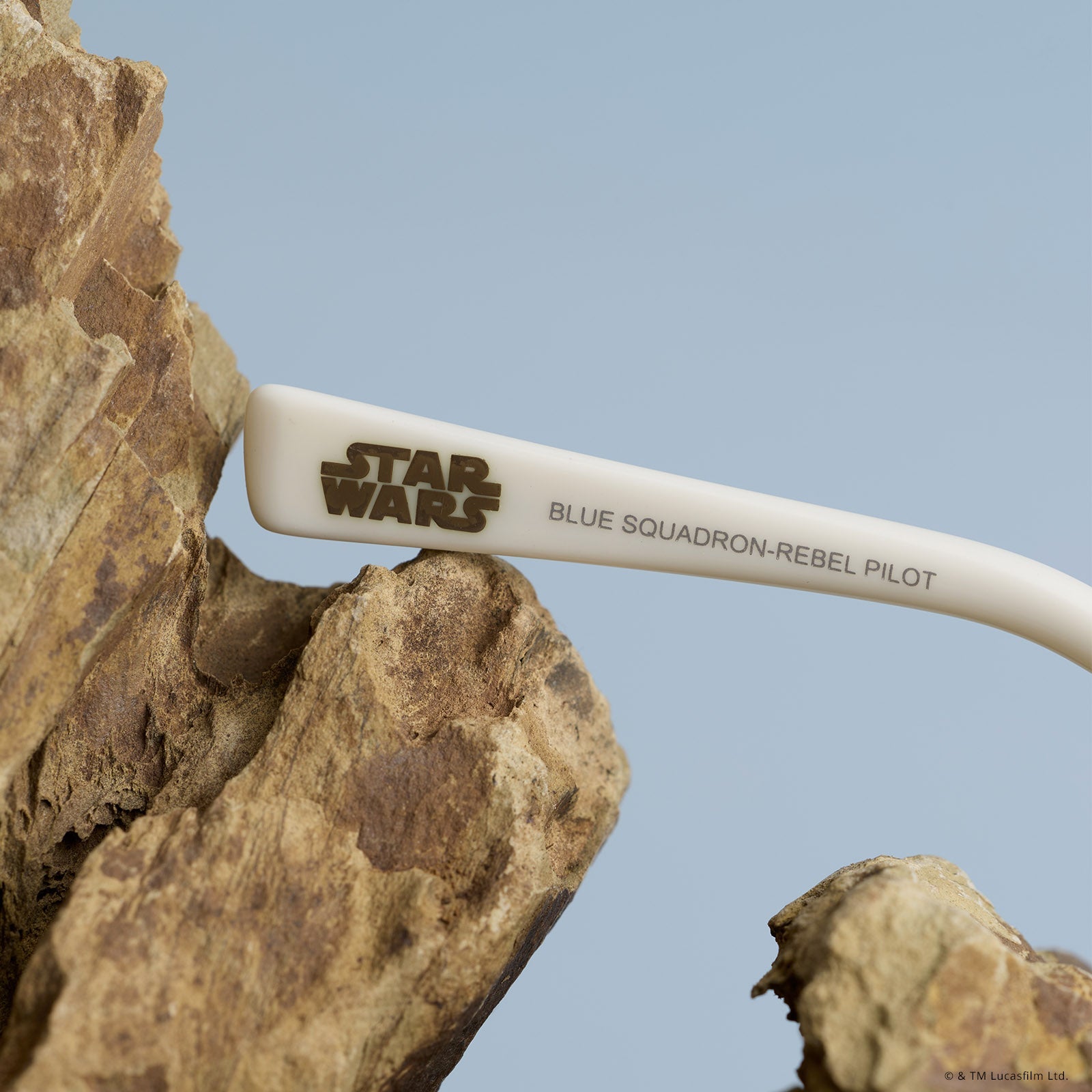 still life - star wars x diff eyewear featuring the blue squadron rebel pilot navigator sunglasses detailed view of temple tips