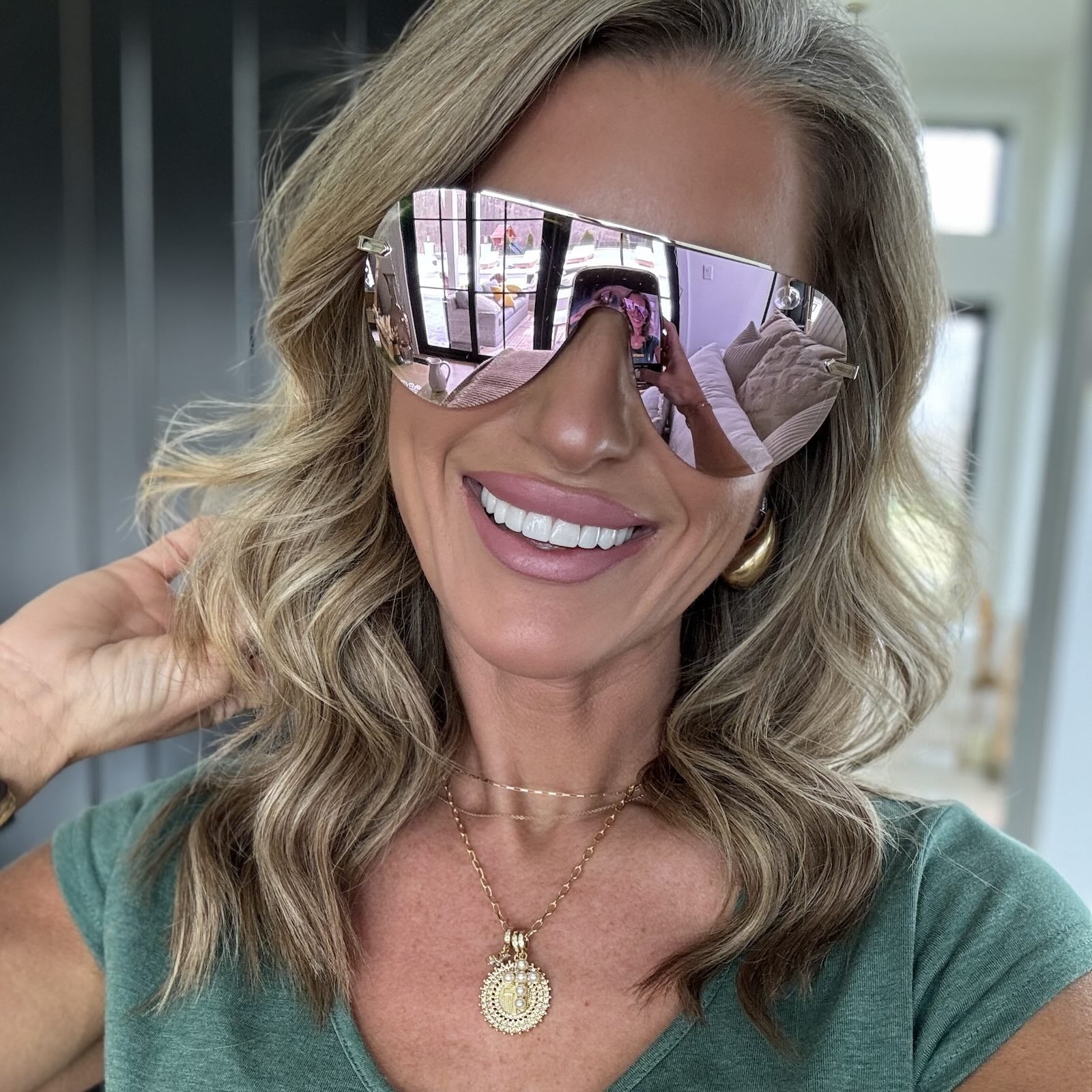 customer content - kalee rogers wearing diff eyewear featuring the imani shield sunglasses with a gold frame and cherry blossom mirror lenses front view