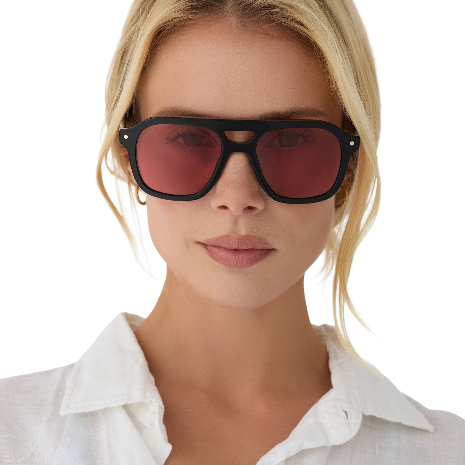 on model - female wearing beach riot x diff eyewear the coast navigator sunglasses with a black acetate frame and red tinted lenses front view