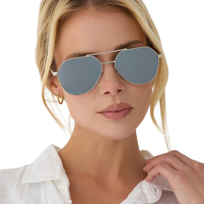 on model - female wearing beach riot x diff eyewear the reserve aviator sunglasses with a silver metal frame and silver mirror lenses front view