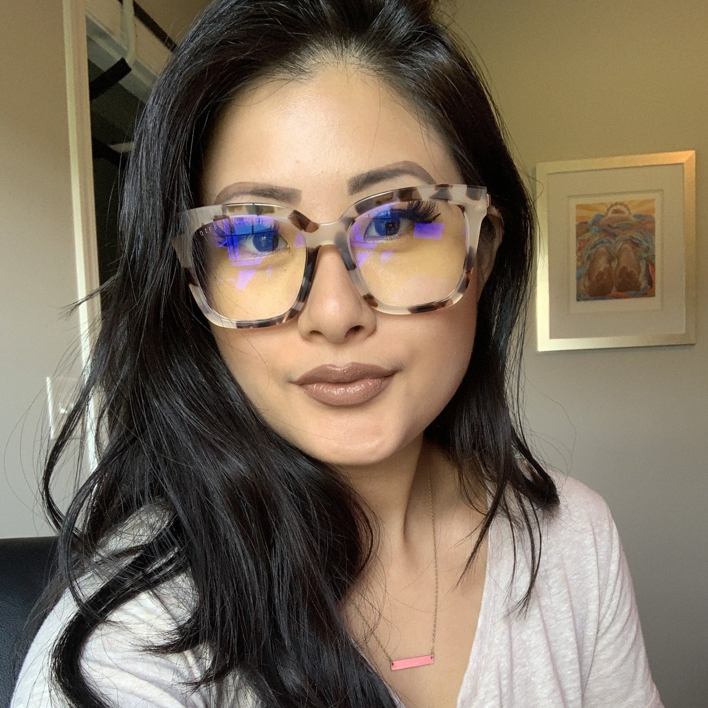 Customer Content - grace wearing the bella cream tortoise blue light 