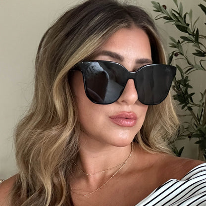 customer content - laurenhornstyle wearing diff eyewear gia round sunglasses with a black frame and grey lenses