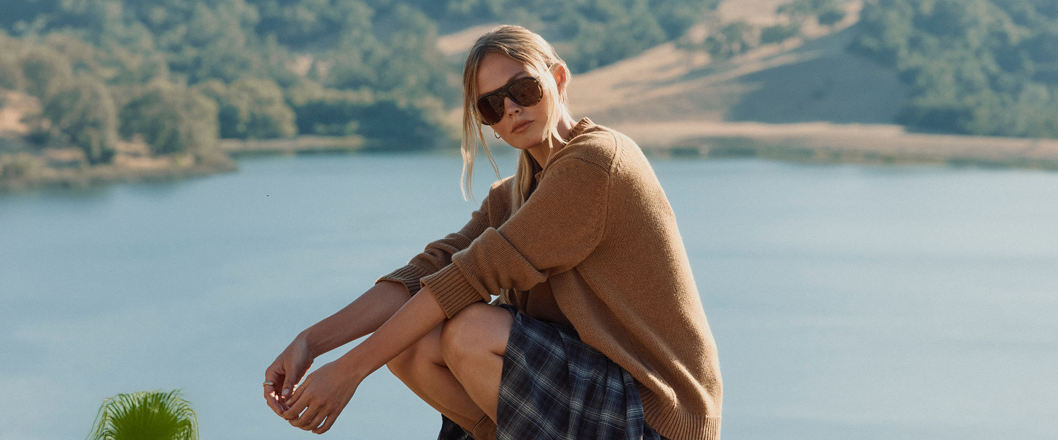 diff eyewear wholesale female wearing tosca iii espresso over looking a lake