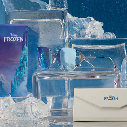 lifestyle - frozen x diff eyewear featuring the elsa oversized square sunglasses with a cool silver gloss metal frame and ice blue gradient lenses