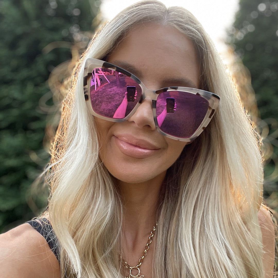 customer content - blonde female wearing Becky II sunglasses with cream tortoise frame and pink mirror lens-