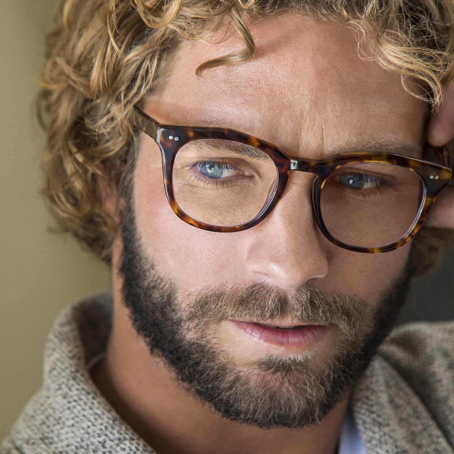 Weston Amber Tortoise and blue light on male model