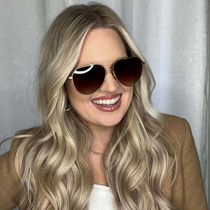 lifestyle - blonde female wearing Dash Brushed Gold Coffee Gradient Sunglasses