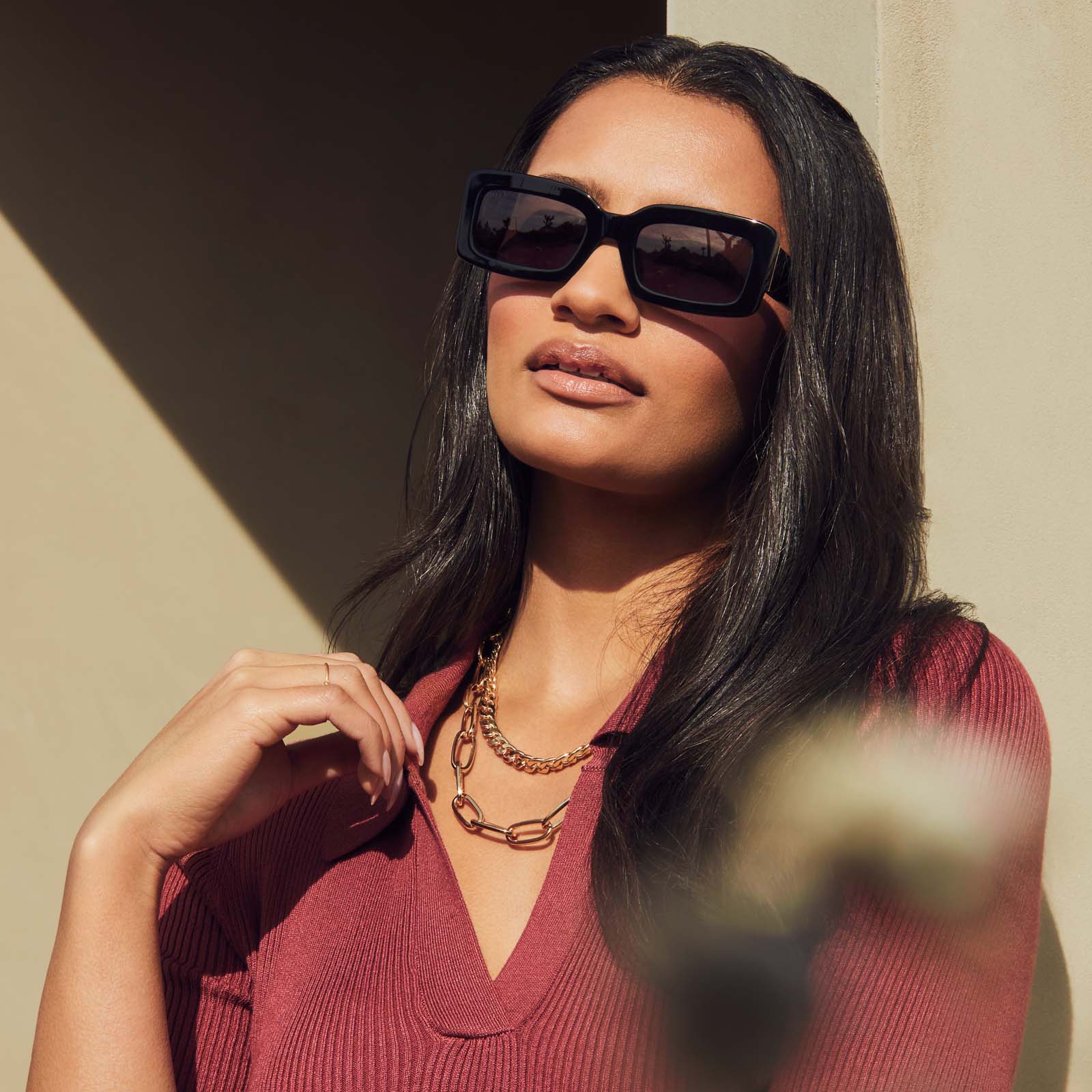 on model - female wearing diff eyewear indy rectangular sunglasses with a black acetate frame and grey polarized lenses front view