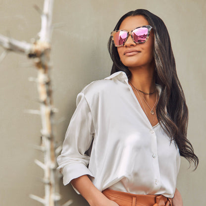 women wearing Becky II sunglasses with cream tortoise frame and pink mirror lens- front view