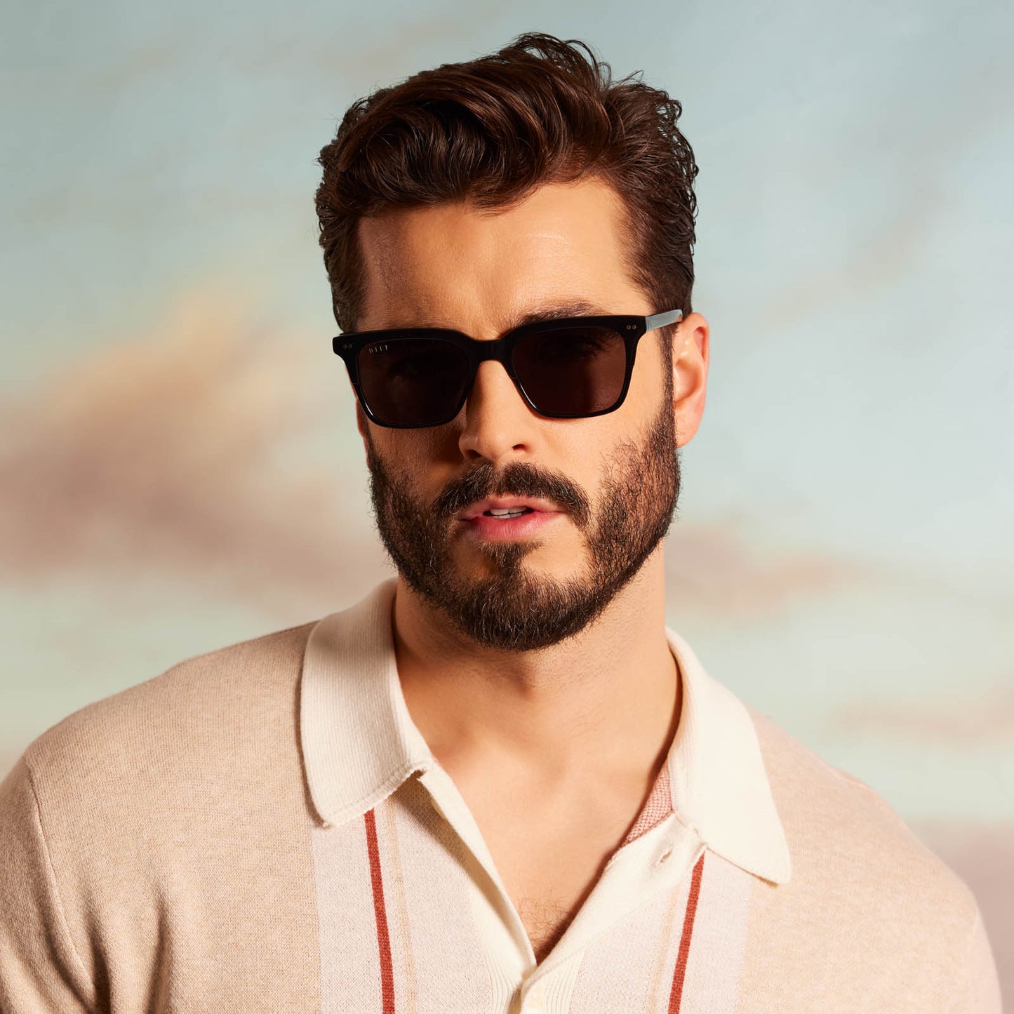 on male model wearing Billie sunglasses with black frame and grey polarized lens