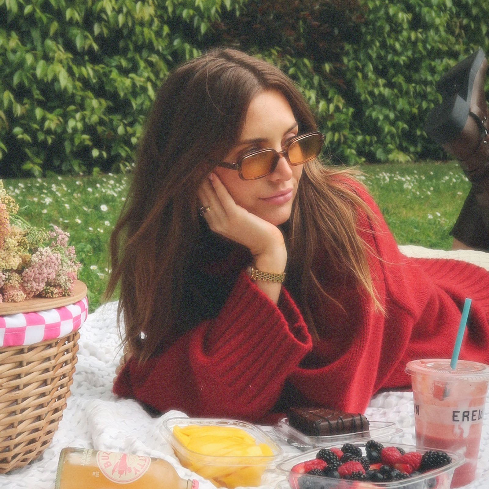 lifestyle - aspyn ovard x diff eyewear female wearing the elle rectangle sunglasses with a tortoise frame and brown tint lenses angled view