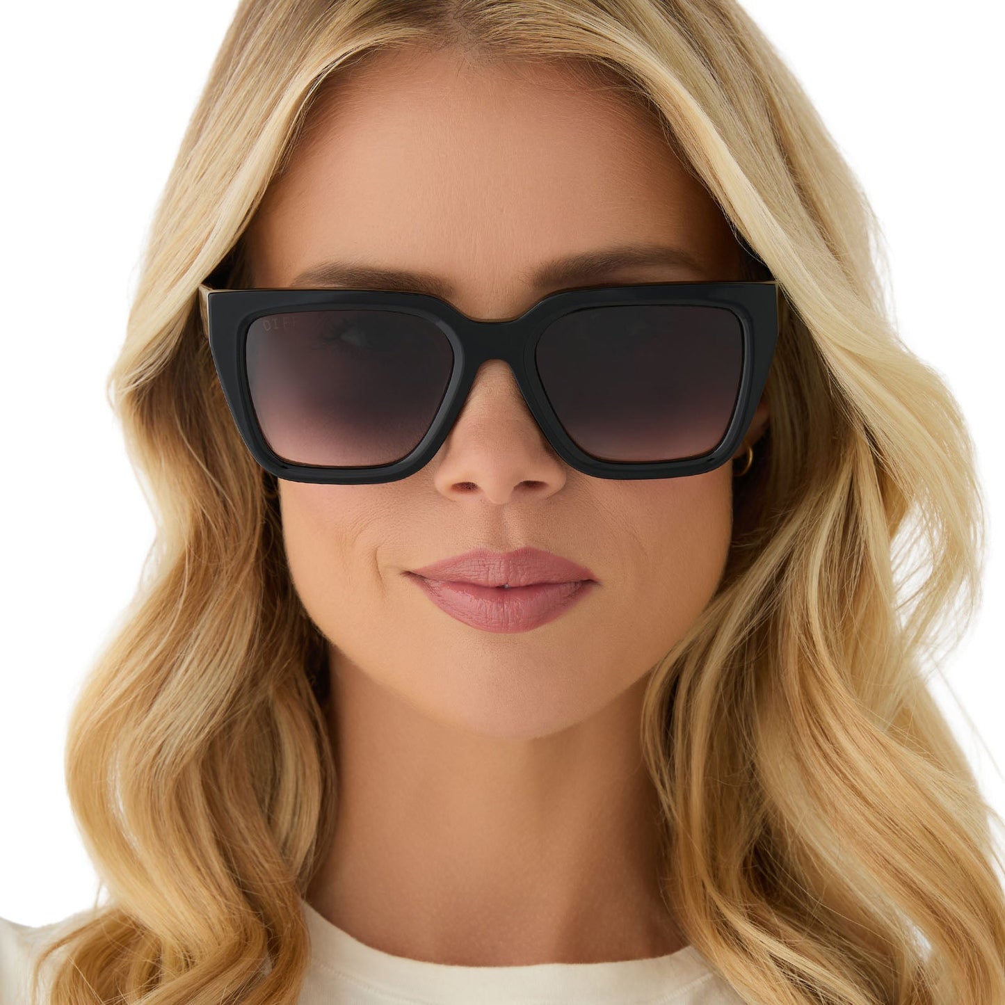 on model - female wearing diff eyewear featuring the amara square sunglasses with a black frame and grey gradient lenses front view