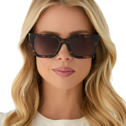 on model - female wearing diff eyewear featuring the amara square sunglasses with a dark cherry lacquer frame and grey gradient lenses front view