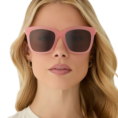 on model - female wearing diff eyewear featuring the bella square sunglasses with a peach frame and brown polarized lenses front view