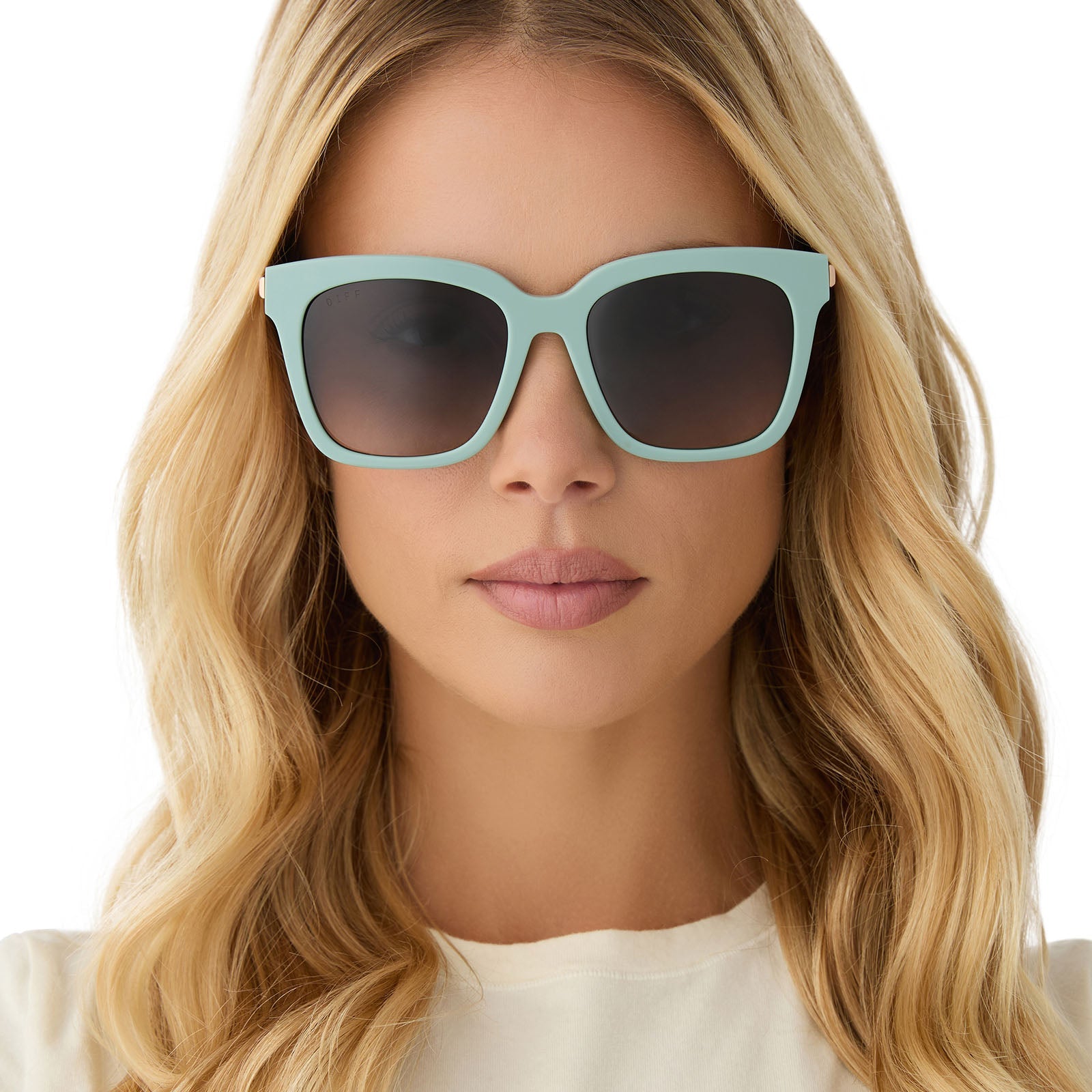 on model - female wearing diff eyewear featuring the bella square sunglasses with a steel teal frame and grey gradient lenses front view