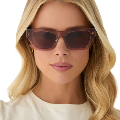 on model - female wearing yellowstone x diff eyewear featuring the beth ii cat eye sunglasses with a cafe ole frame and brown polarized lenses front view