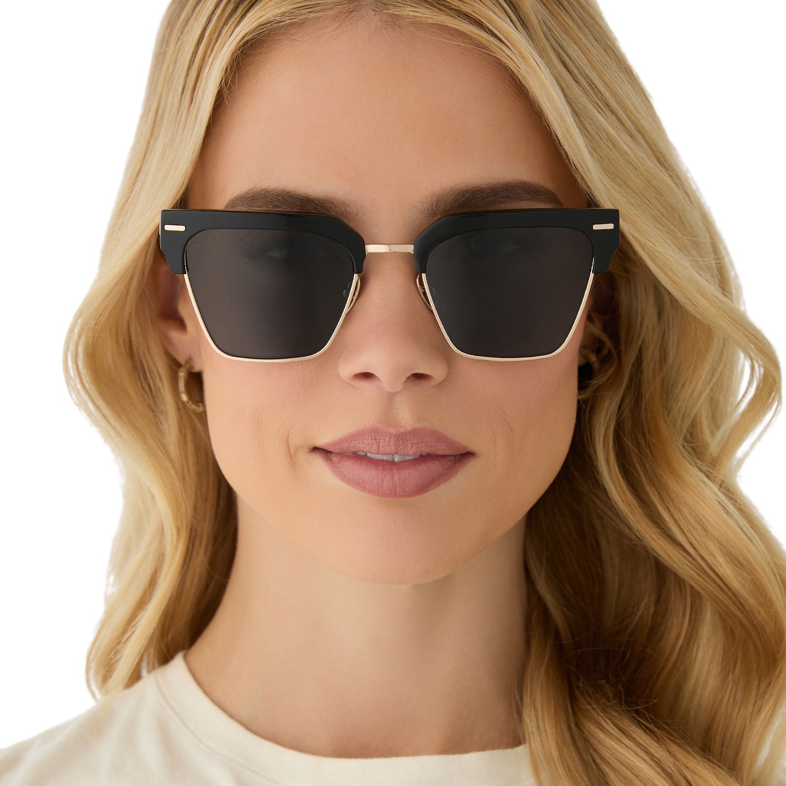 on model - female wearing diff eyewear featuring the capri rectangle sunglasses with a black frame and grey polarized lenses front view
