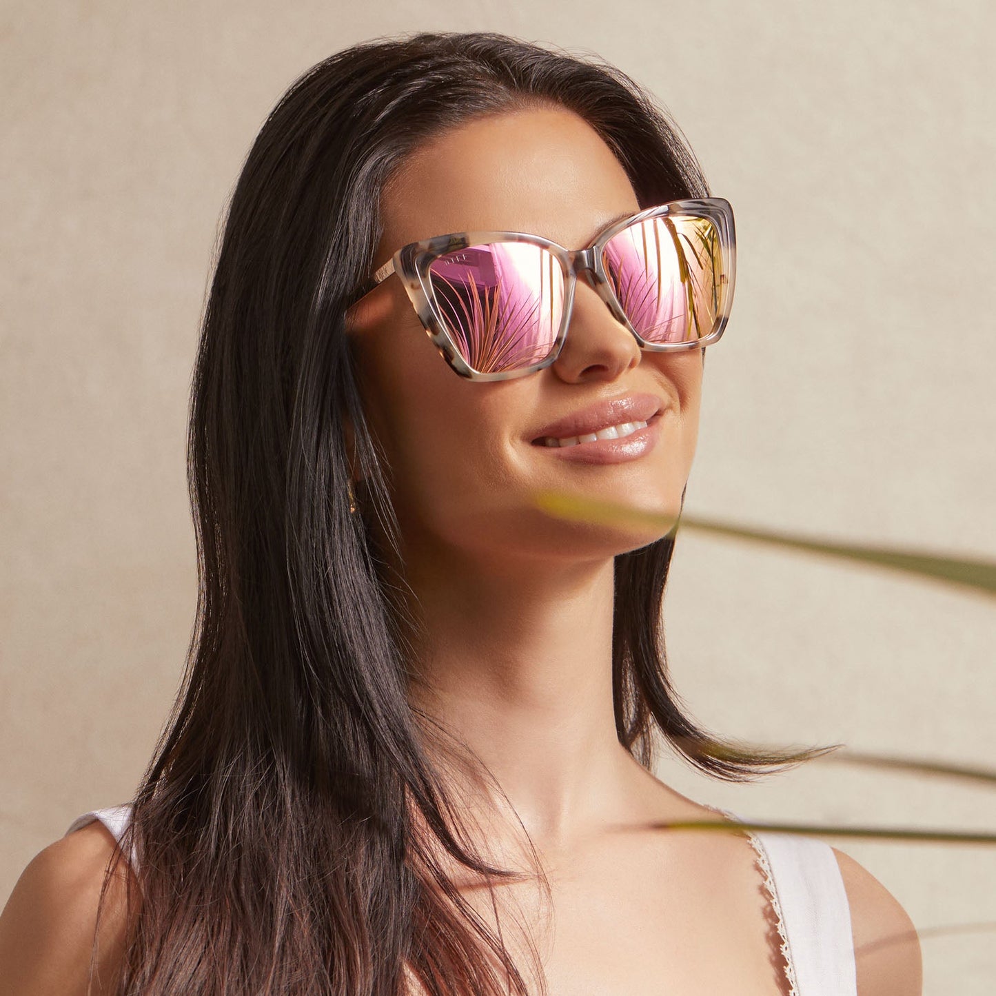 on model - female wearing Becky II sunglasses with cream tortoise frame and pink mirror lens- front view