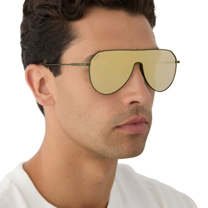 on model - male wearing diff eyewear featuring the dash shield shield sunglasses with a moss metal frame and moss mirror lenses side view