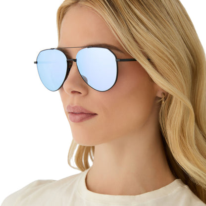 on model - female wearing diff eyewear featuring the dash aviator sunglasses with a black frame and lavender mirror lenses side view