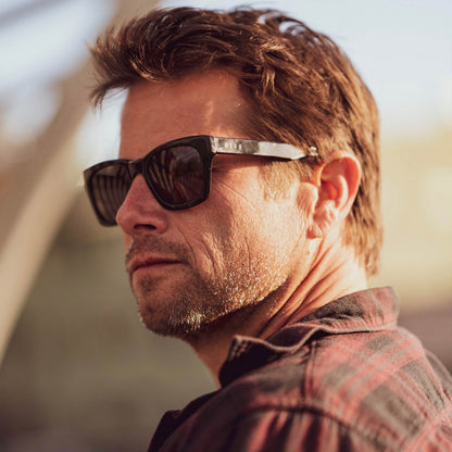 customer content - brunette male wearing dean black and grey polarized sunglasses