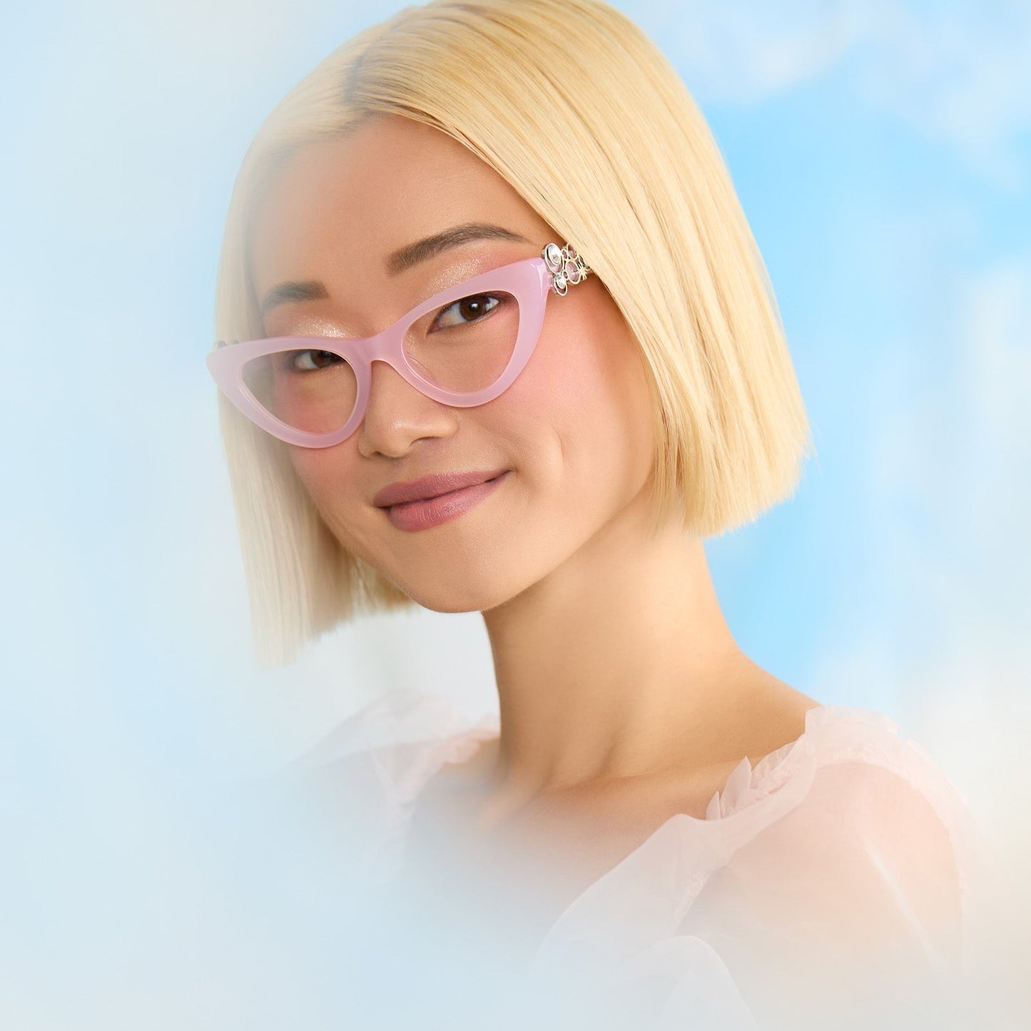 on model - female wearing wicked x diff eyewear featuring the glinda upland for good cat eye prescription glasses with a pink frame front view