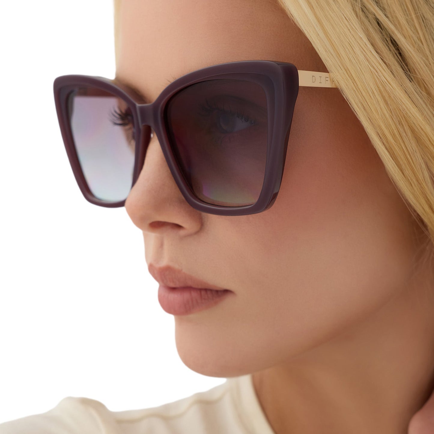 on model - blonde female wearing diff eyewear becky ii cat eye sunglasses with cocoa powder frame and lenses angled view