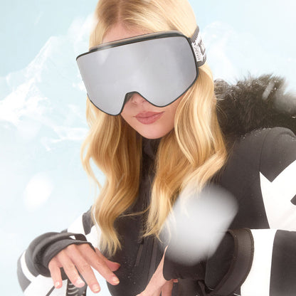 lifestyle - female wearing diff sport frost goggles houndstooth with silver mirror polarized lens front view