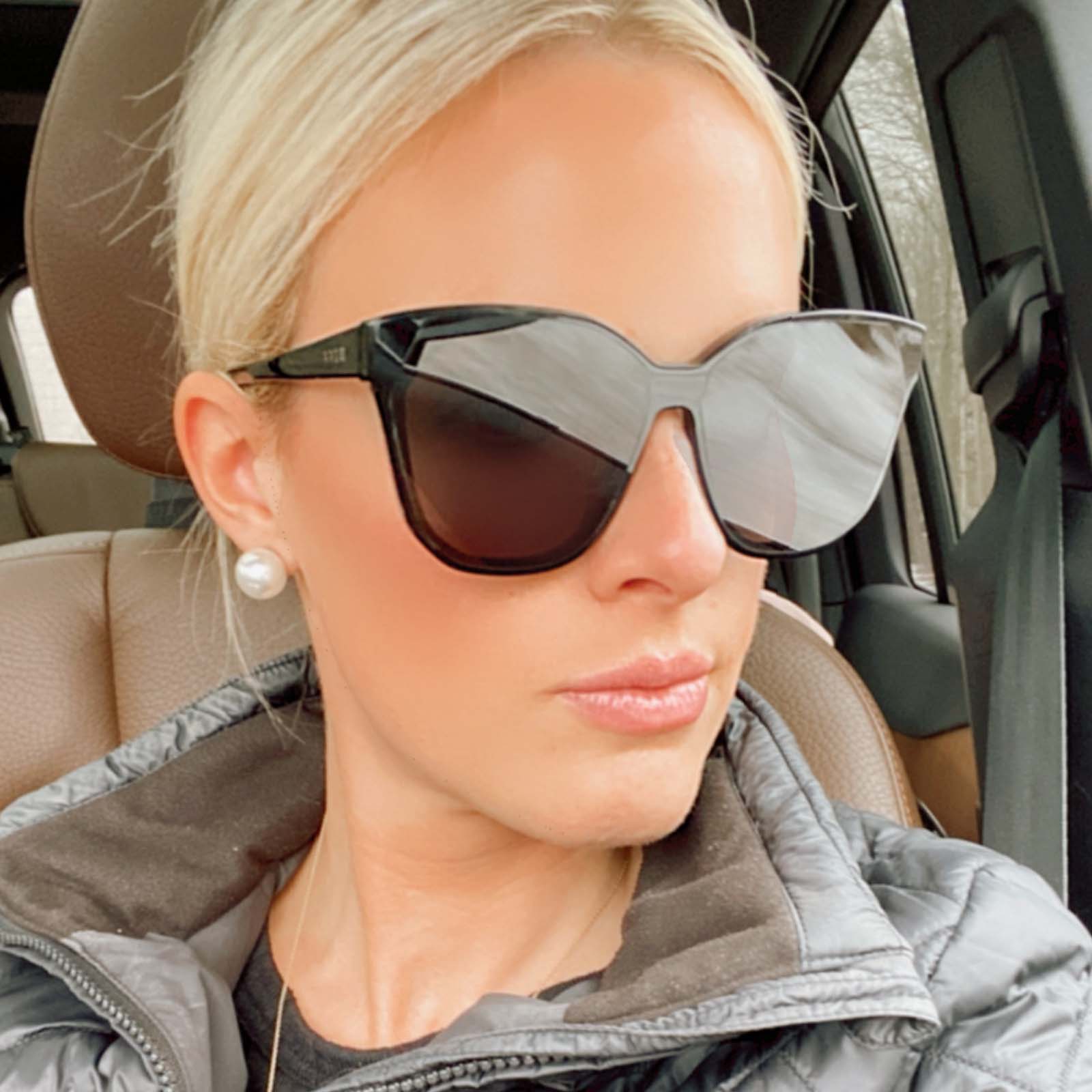 Customer Content - Woman wearing the Gia Cream Tortoise + Grey Womens Sunglasses in her car