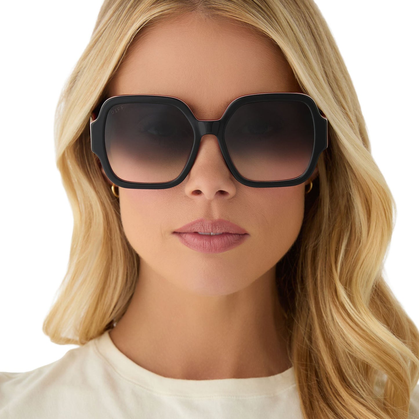 on model - female wearing clueless x diff eyewear featuring the dionne square sunglasses with a black frame and grey gradient lenses front view