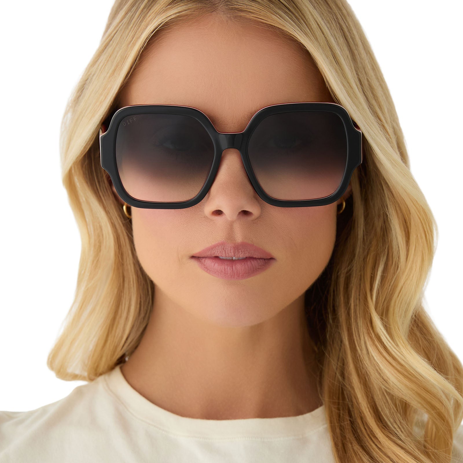on model - female wearing clueless x diff eyewear featuring the dionne square sunglasses with a black frame and grey gradient lenses front view