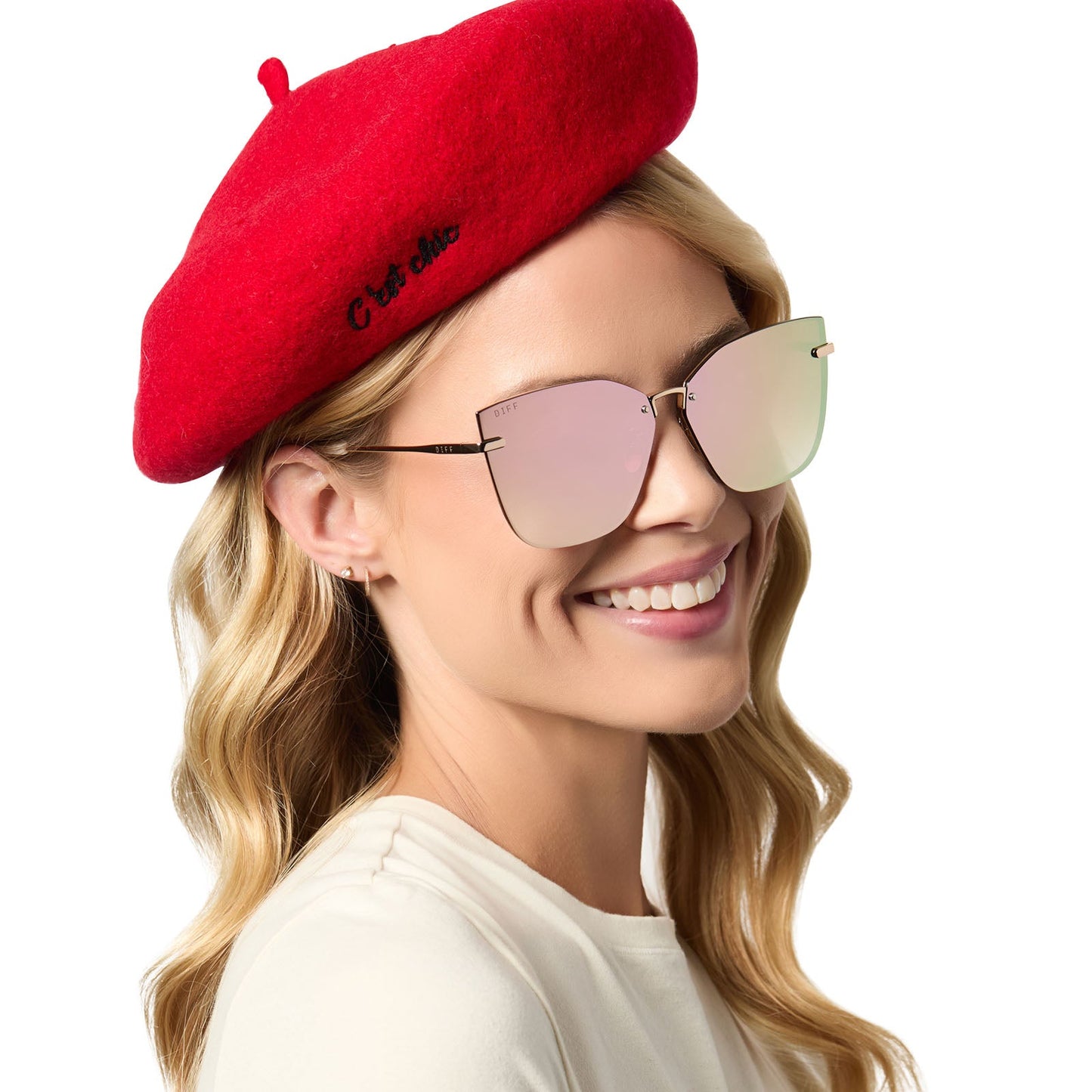 on model - female wearing diff eyewear x emily in paris featuring the mindy square sunglasses and free with purchase red beret hat