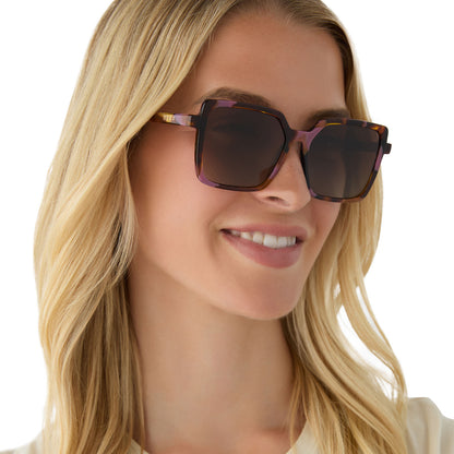 on model - female wearing diff eyewear featuring the esme square sunglasses with a torino tortoise frame and brown gradient polarized lenses angled view