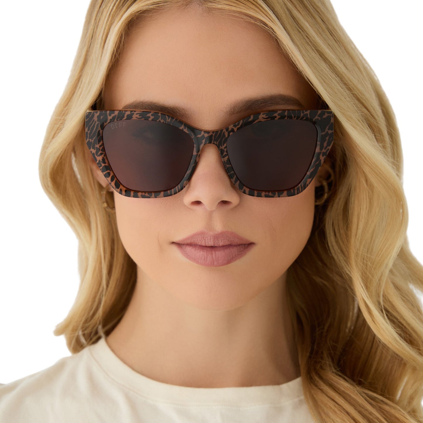 on model - female wearing diff eyewear featuring the evie cat eye sunglasses with a animal print frame and brown lenses front view