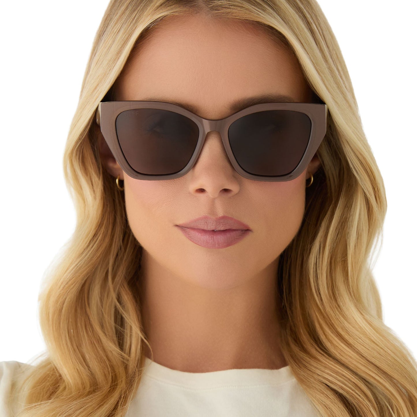 on model - female wearing diff eyewear featuring the evie cat eye sunglasses with a moscow mule frame and brown lenses front view
