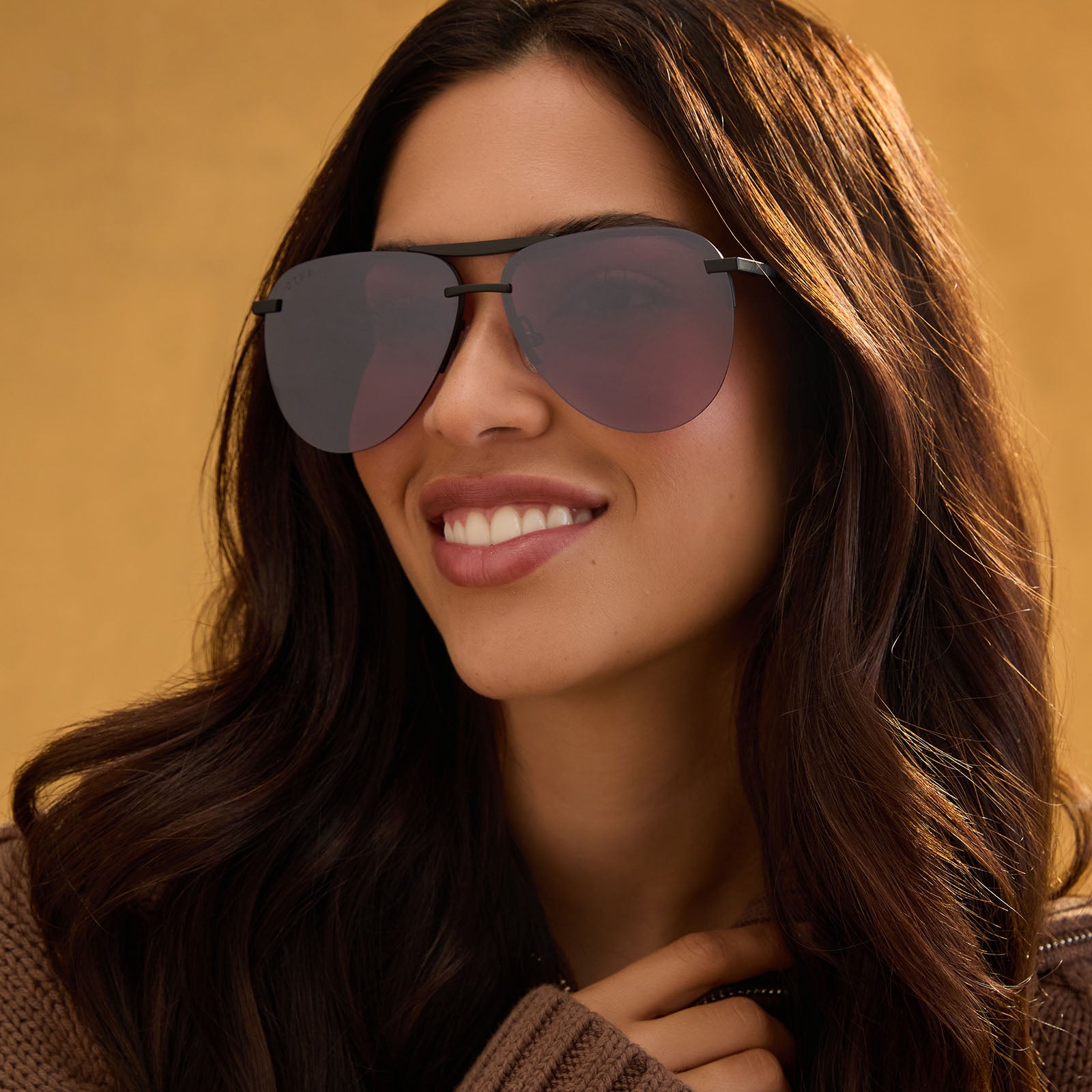 lifestyle - female wearing diff eyewear tahoe aviator sunglasses black & aubergine silver flash front view