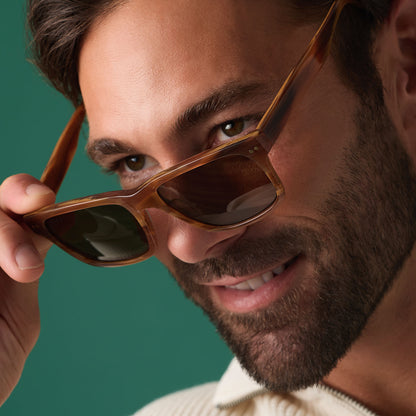 on model - male wearing diff eyewear featuring the gino xl square sunglasses with a longhorn brown frame and brown polarized lenses front view