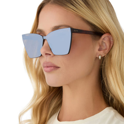 on model - female wearing diff eyewear featuring the goldie cateye sunglasses with a sequoia tortoise frame and brown gold flash lenses side view