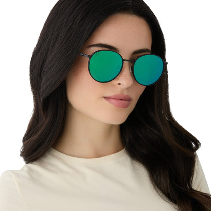on model - female wearing harry potter x diff eyewear featuring the snape round sunglasses with a matte black metal frame and green mirror lenses angled view